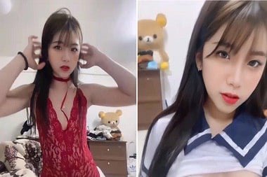 Cô gái xinh đẹp cởi quần áo